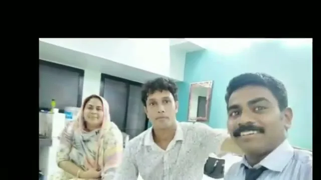 Sevagan Satheesh with a couple in the Sevagan office